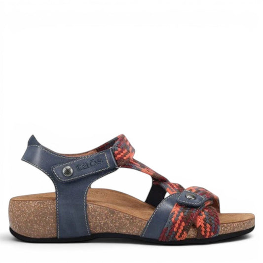 Taos Trulie L.E. navy multi woven textile and leather sandal with adjustable hook and loop straps. Photo of outside side view.