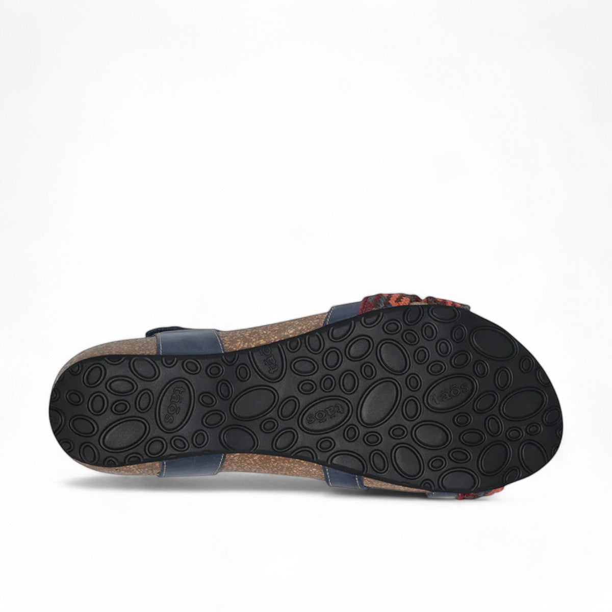 Taos Trulie L.E. navy multi woven textile and leather sandal with adjustable hook and loop straps. Photo of bottom view.
