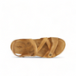 Taos Universe camel leather sandal with Z-strap design, cork footbed, and medallion embellishments. Photo of upper view.