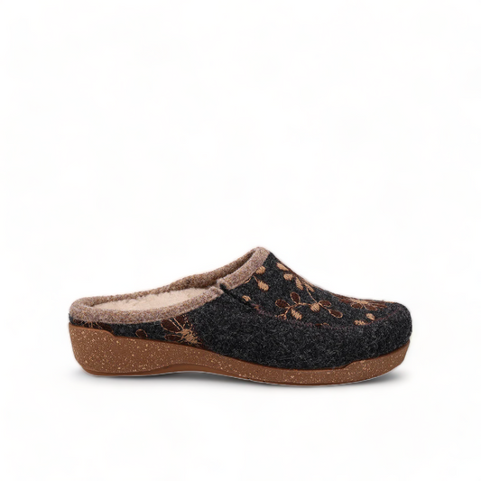 Taos Woolderness charcoal wool clog with hand-embroidered floral details and faux fur lining. Photo of left side view.