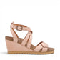 Taos Xcellent shell pink leather wedge sandals with crisscross straps and cork foot bed. Photo of outside side view.