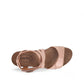 Taos Xcellent shell pink leather wedge sandals with crisscross straps and cork foot bed. Photo of upper view.