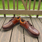 tata brown leather lace-up shoe with textured panels, handmade stitching, and a durable rubber outsole.