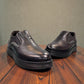 TATA SHOES DAMAVAND black leather slip-on shoes with handmade stitching and durable rubber outsole.