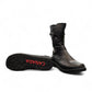Toe Warmers Rebecca black mid-calf boots featuring dual silver buckle straps and a comfortable wedge sole. Photo of bottom view.