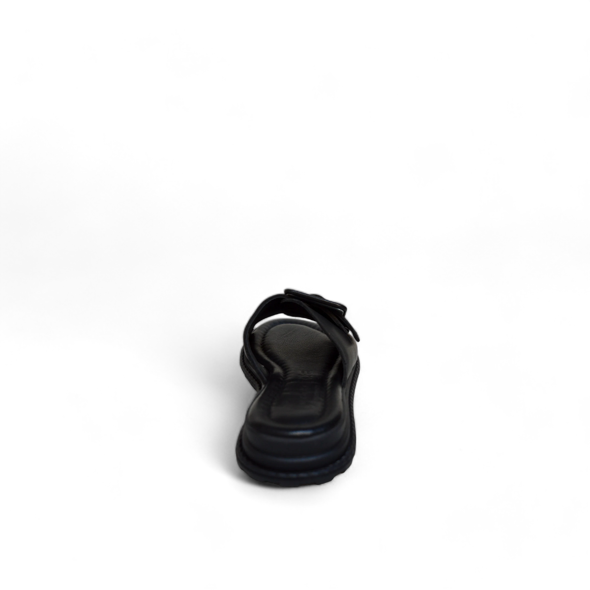 Tyche Monroe black leather slide sandals with adjustable buckle and cushioned insole