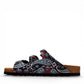 Viking Banff three-strap sandal in black paisley print with cork midsole and adjustable buckles.
photo of the left side