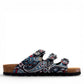 Viking Banff three-strap sandal in black paisley print with cork midsole and adjustable buckles.
photo of the right side