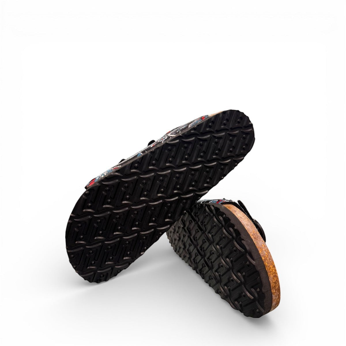 Viking Banff three-strap sandal in black paisley print with cork midsole and adjustable buckles.
photo of the bottom side