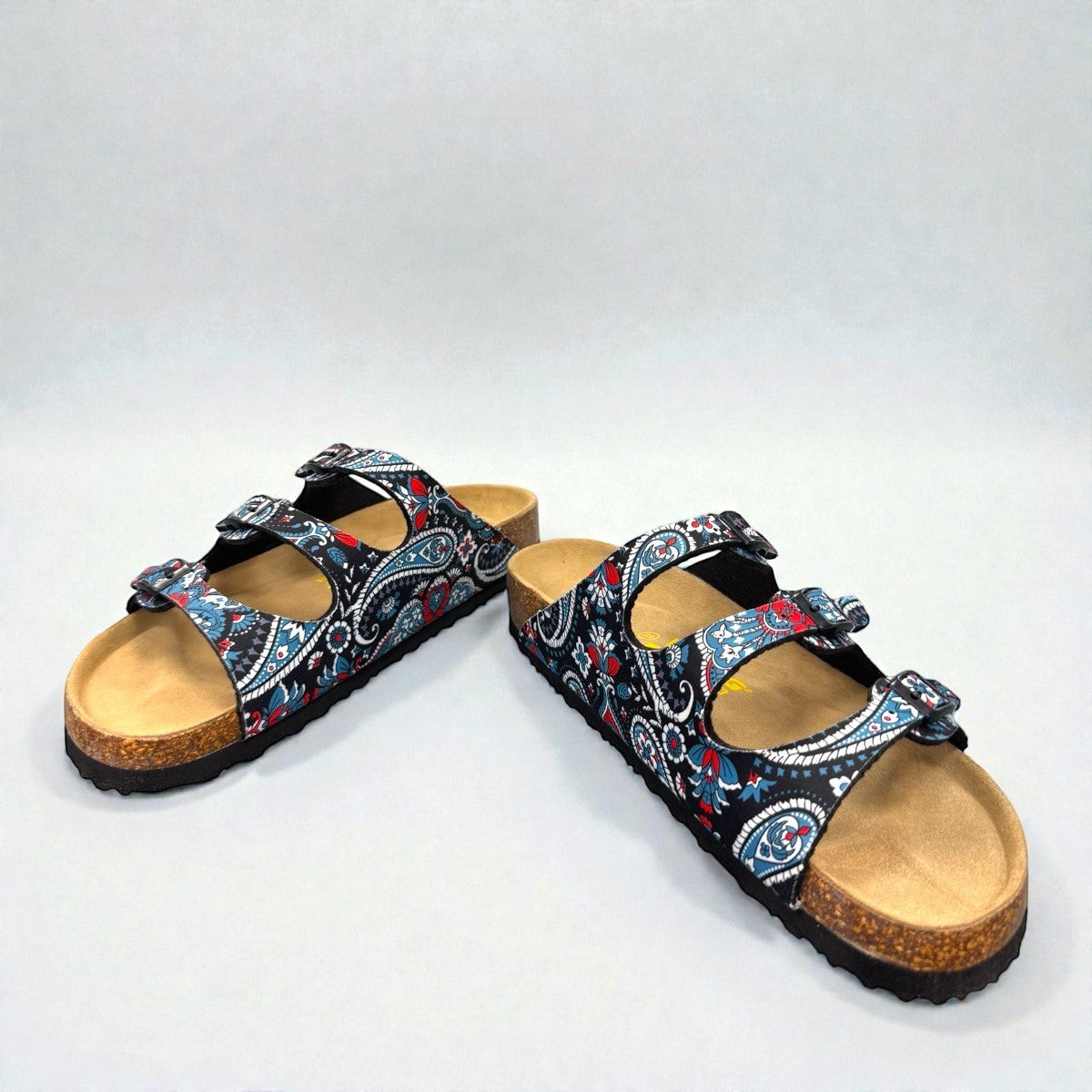 Viking Banff three-strap sandal in black paisley print with cork midsole and adjustable buckles.
photo of the front side