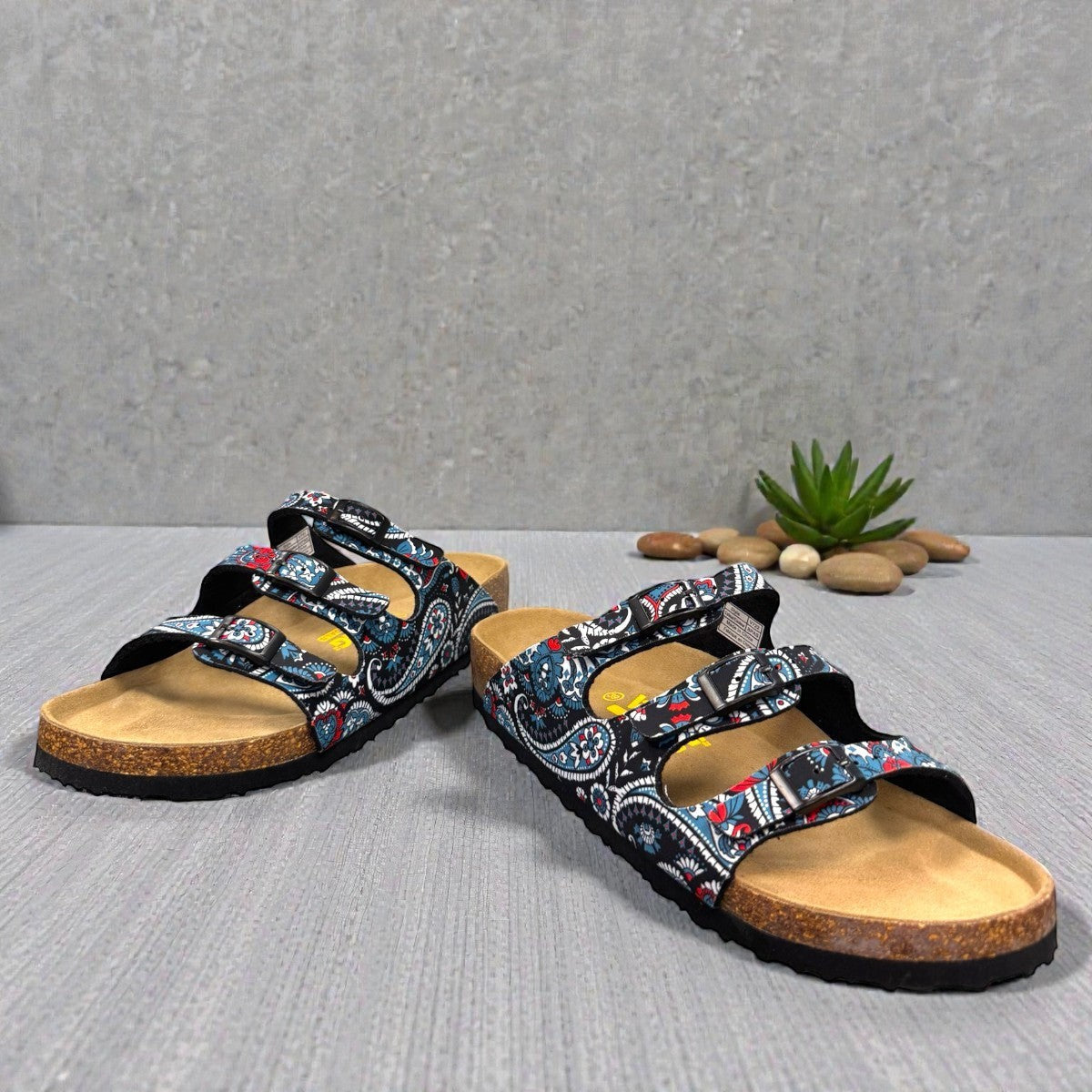 Viking Banff three-strap sandal in black paisley print with cork midsole and adjustable buckles.
photo of the front side