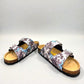Viking Chatham two-strap sandal with a blue and brown bubble print, cork midsole, and buckle closures.
photo of the front