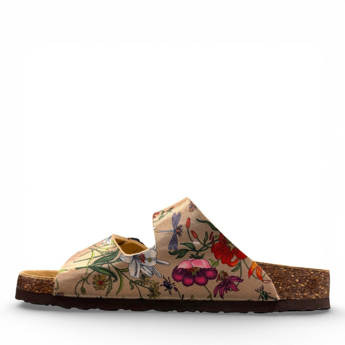 Viking Chatham toe-loop sandal with a beige floral wild garden print, cork midsole, and adjustable buckles.
photo of the left side