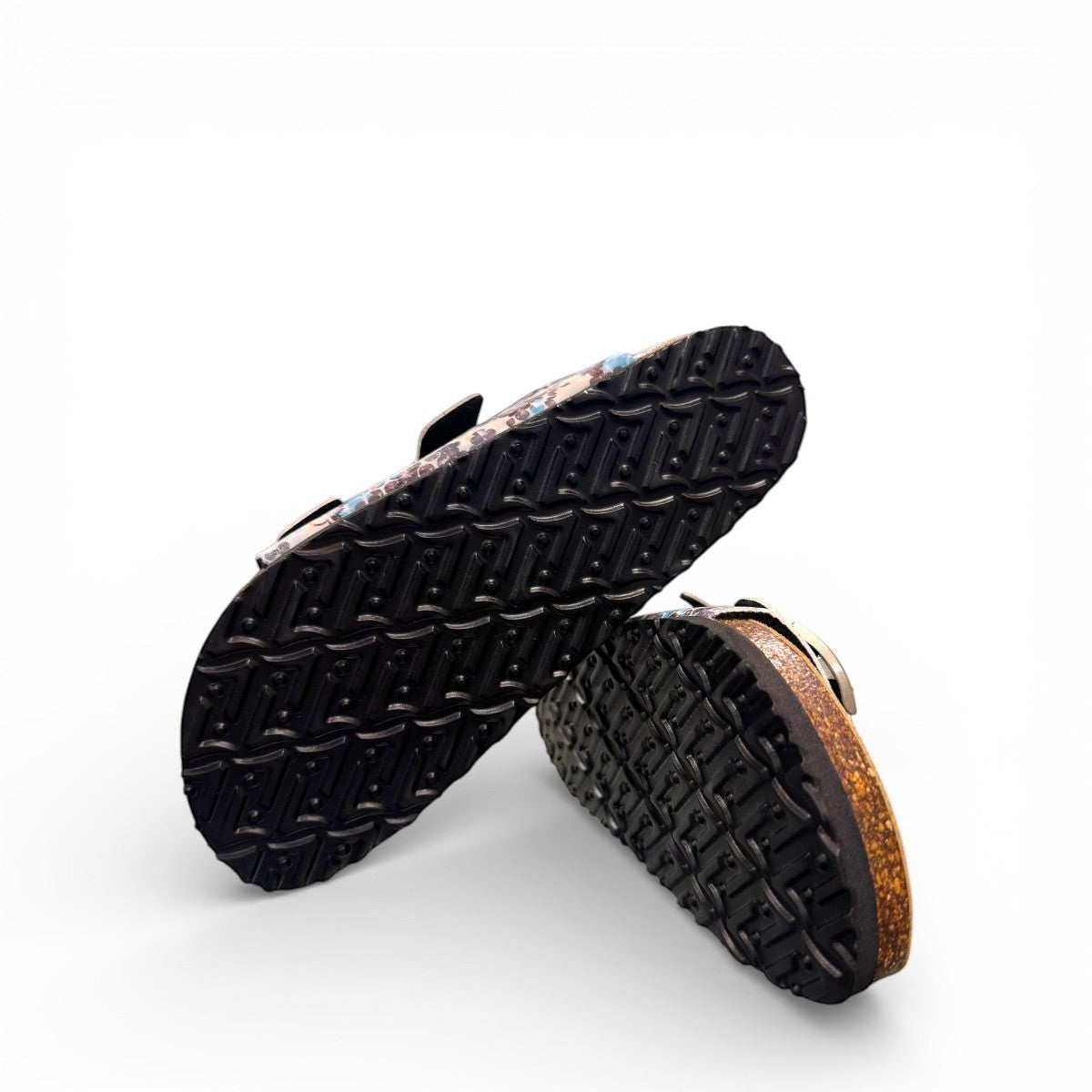 Viking Chatham two-strap sandal with a blue and brown bubble print, cork midsole, and buckle closures.
photo of the bottom side