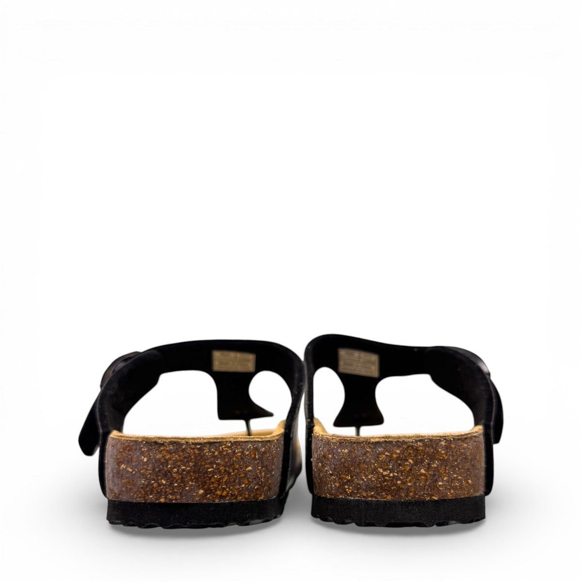 Viking Laguna glitzy rainbow thong sandal with a cork footbed and adjustable buckle strap.
photo of the back side