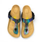 Viking Laguna glitzy rainbow thong sandal with a cork footbed and adjustable buckle strap.
photo of the top side
