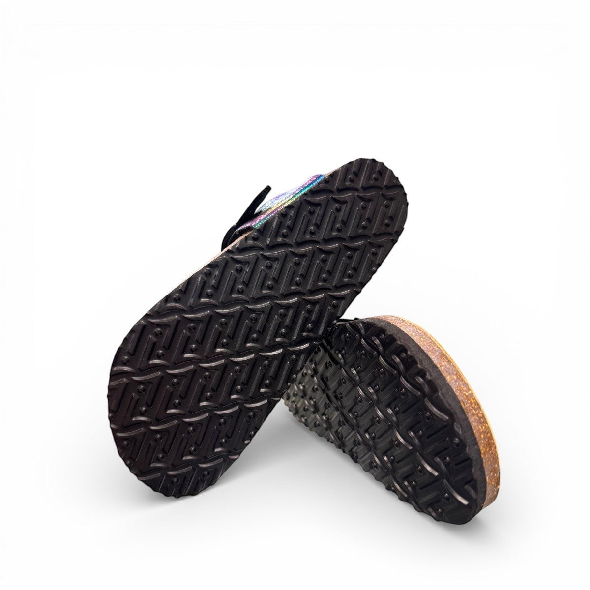 Viking Laguna glitzy rainbow thong sandal with a cork footbed and adjustable buckle strap.
photo of the bottom side