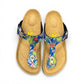 Viking Laguna thong sandals with blue tropical butterfly print strap and adjustable buckle on cork sole.
photo of the top side
