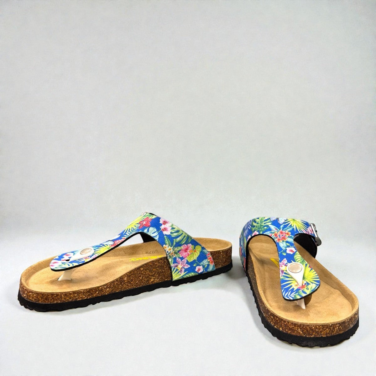 Viking Laguna thong sandals with blue tropical butterfly print strap and adjustable buckle on cork sole.
photo of the front side