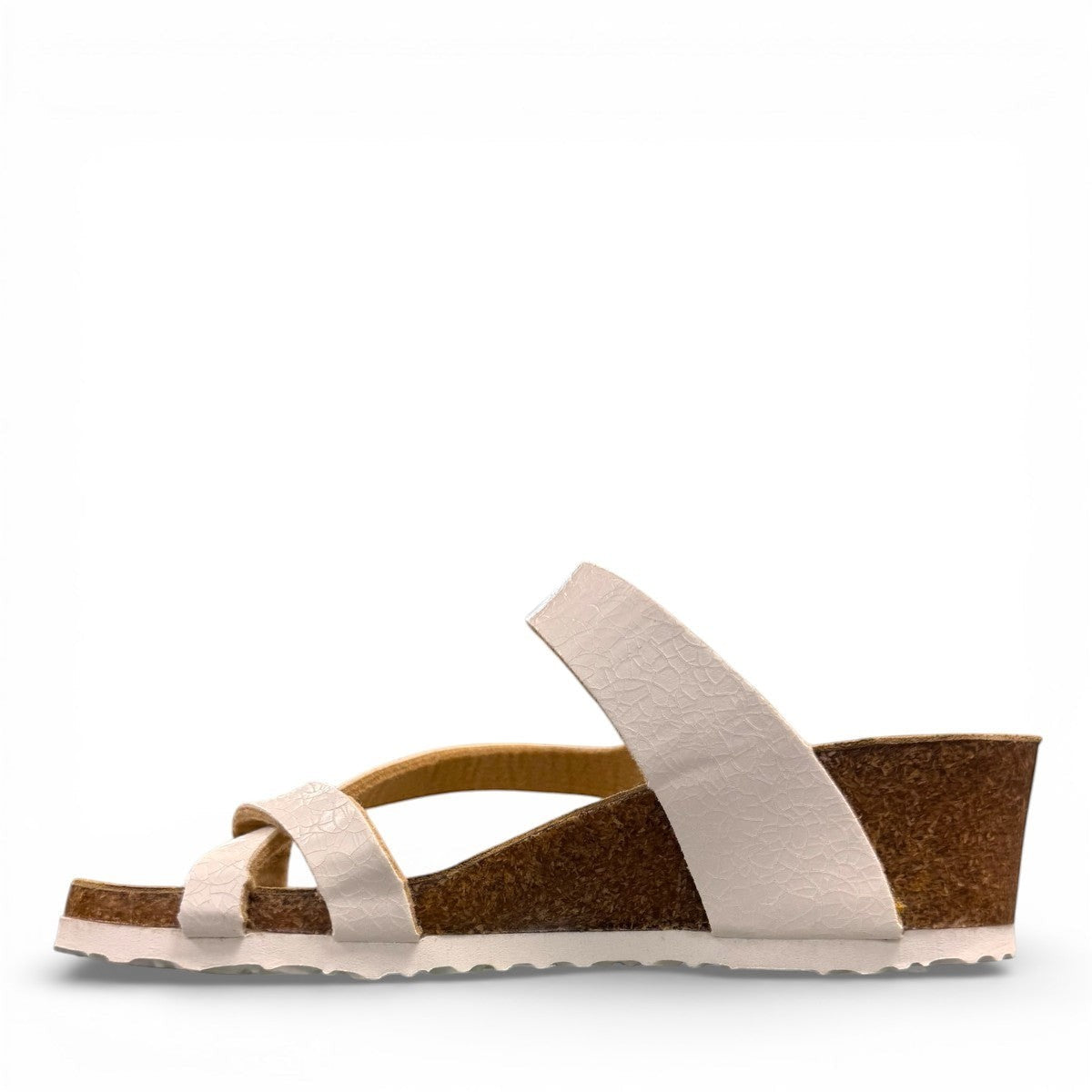 Viking Tampa white leather wedge sandals with a cork sole and adjustable buckle strap.
photo of the left side