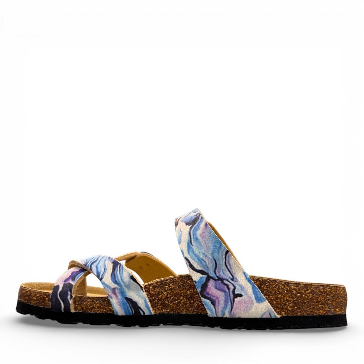 Viking Chatham toe-loop sandal with a beige floral wild garden print, cork midsole, and adjustable buckles.
photo of the left side