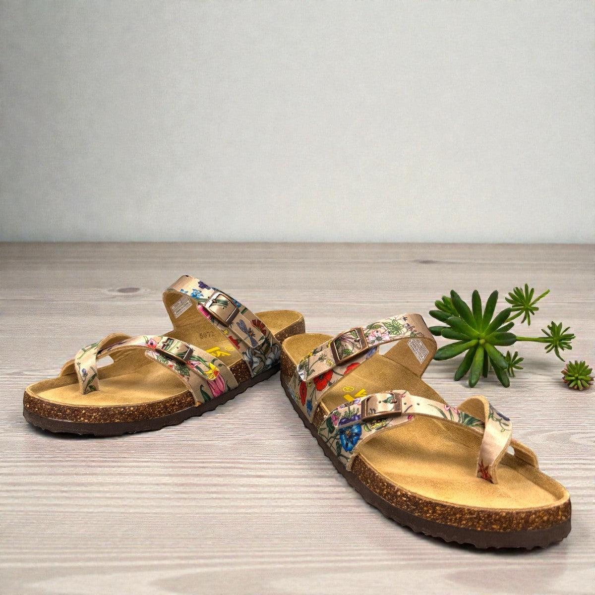 VIKING TOFINO toe-loop sandal in Wild Garden floral print with adjustable buckles and cork footbed.
photo of the front side