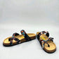 Viking Banff three-strap sandal in black paisley print with cork midsole and adjustable buckles.
photo of the front side