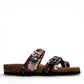 Viking Tofino toe-loop sandal in dark garden floral print with adjustable buckles and cork footbed.
photo of the right side