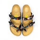 Viking Banff three-strap sandal in black paisley print with cork midsole and adjustable buckles.
photo of the top side