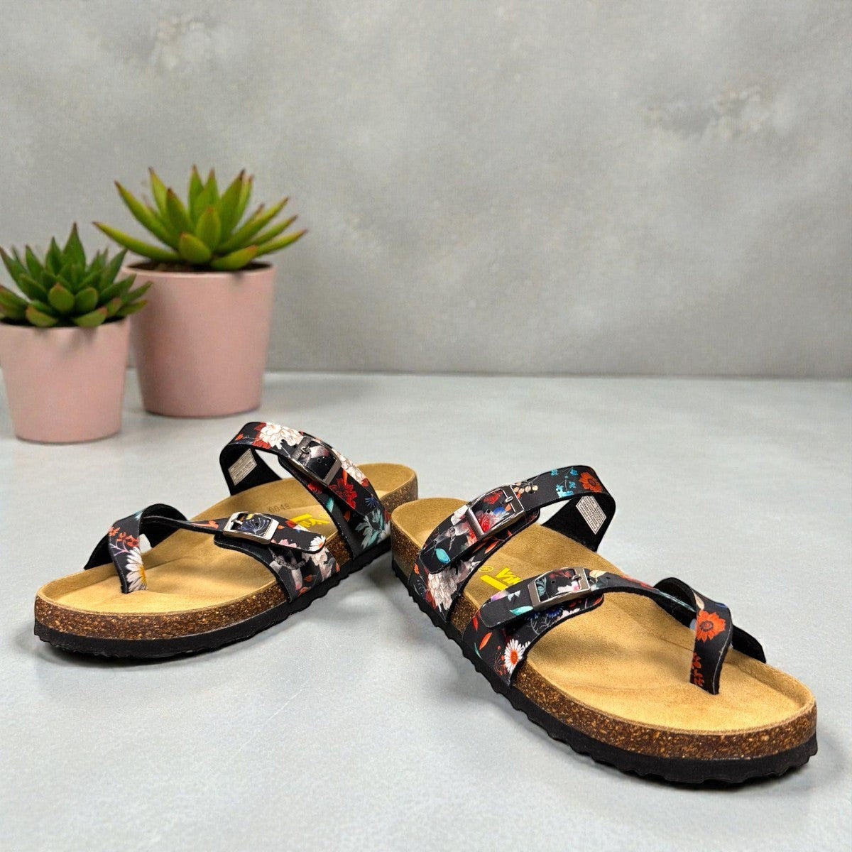 Viking Banff three-strap sandal in black paisley print with cork midsole and adjustable buckles.
photo of the front side