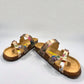 VIKING TOFINO toe-loop sandal in Wild Garden floral print with adjustable buckles and cork footbed.
photo of the front side