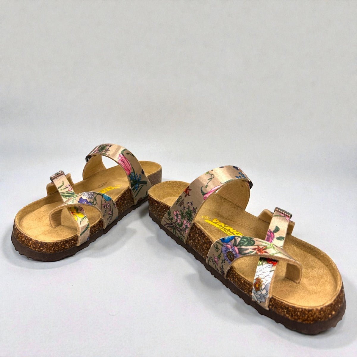 VIKING TOFINO toe-loop sandal in Wild Garden floral print with adjustable buckles and cork footbed.
photo of the front side