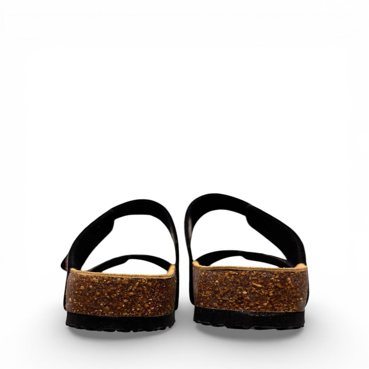 Viking Verlo slide sandals featuring a vibrant blue tropical floral print, two adjustable buckles, and a cork sole.
photo of the back side