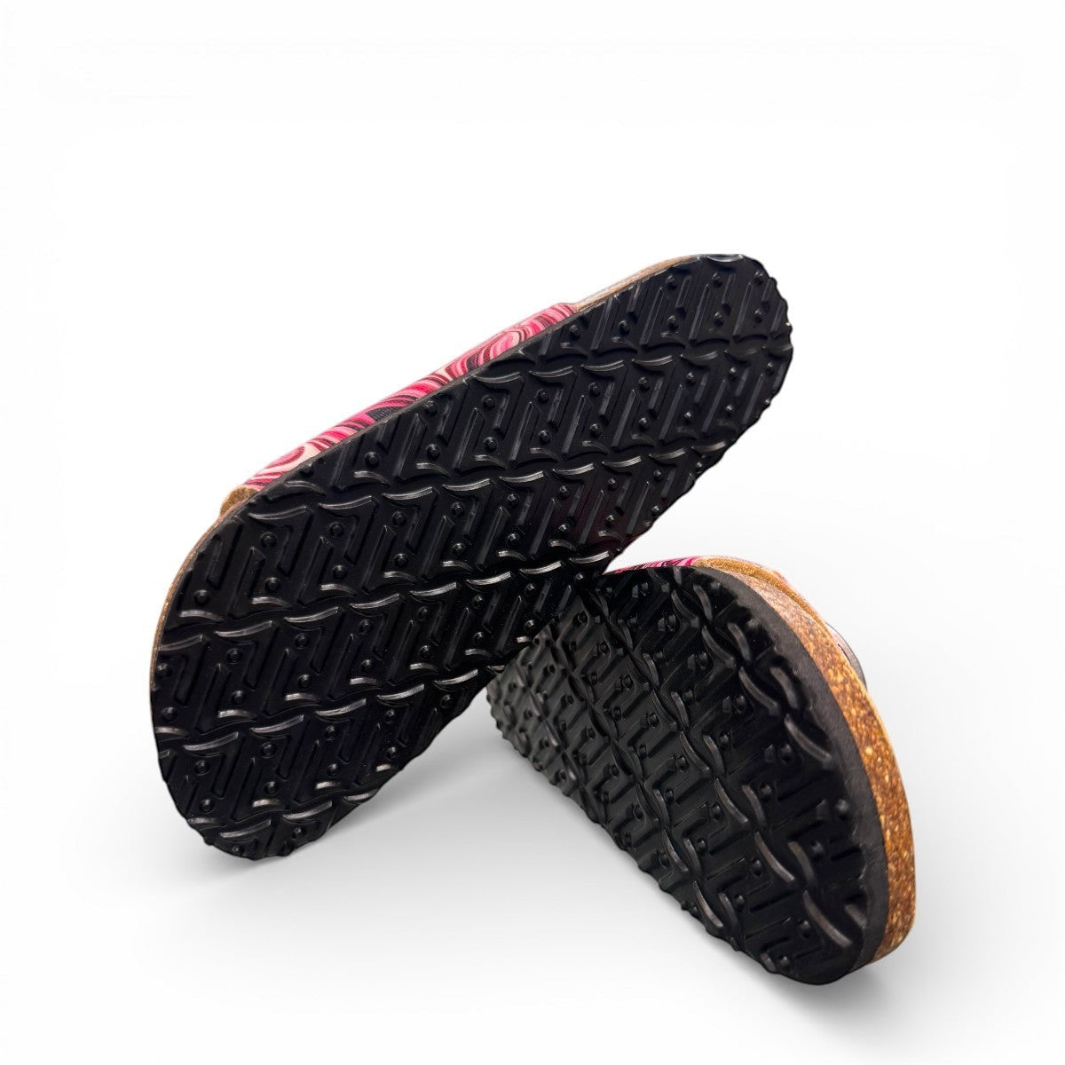 Viking Whistler berry marble toe-loop sandal with adjustable buckles and cork-wrapped contoured footbed.
photo of the bottom side