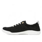 Vionic Venice Pismo black eco-conscious cotton canvas slip-on sneaker with white laces and TPR outsole.
photo of the left side