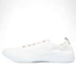 Vionic Venice Pismo white vegan cotton canvas slip-on sneaker with rose gold eyelets.
photo of the left side