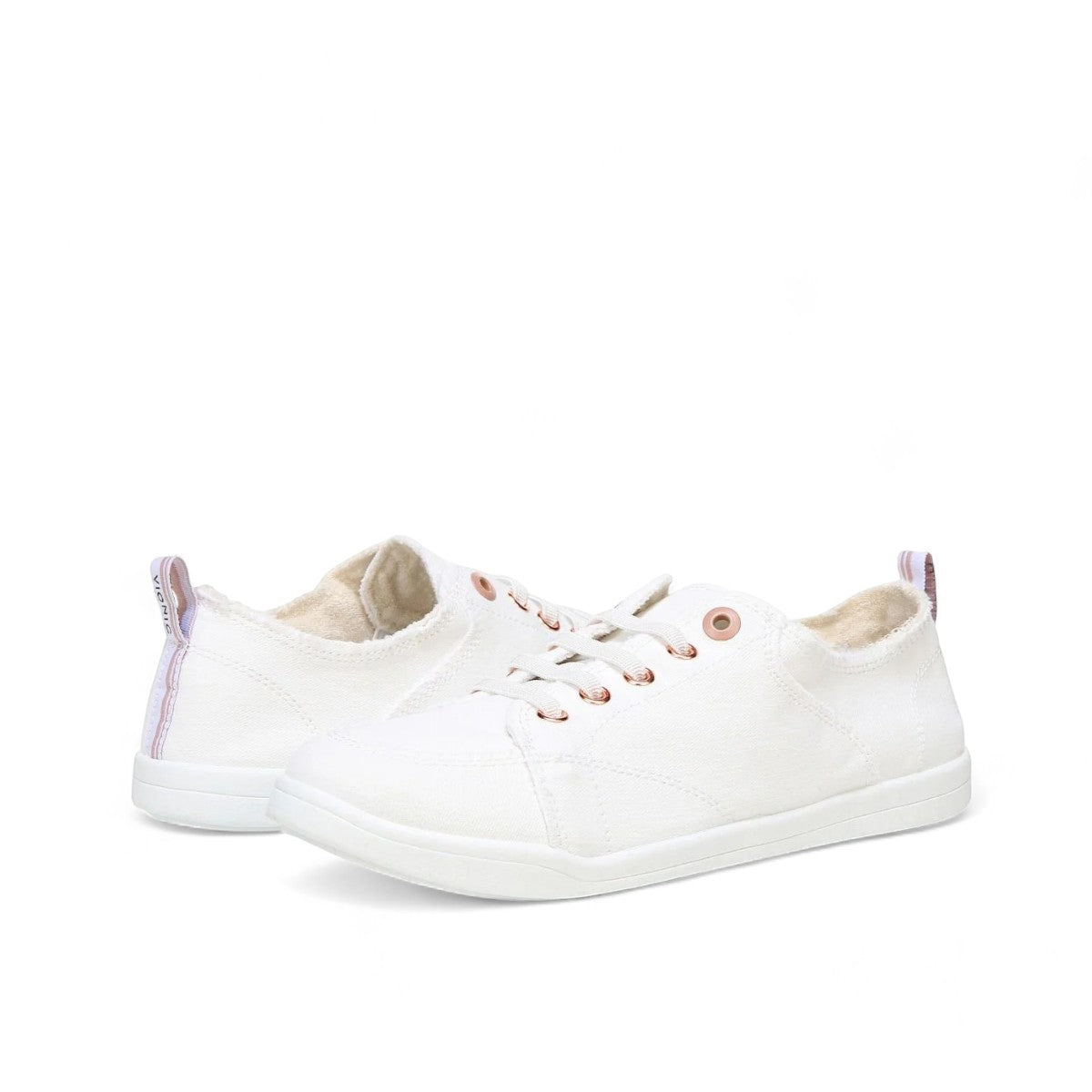 Vionic Venice Pismo white vegan cotton canvas slip-on sneaker with rose gold eyelets.
photo of the front side