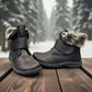 Wanderlust black waterproof winter boots with faux fur trim and adjustable velcro strap
