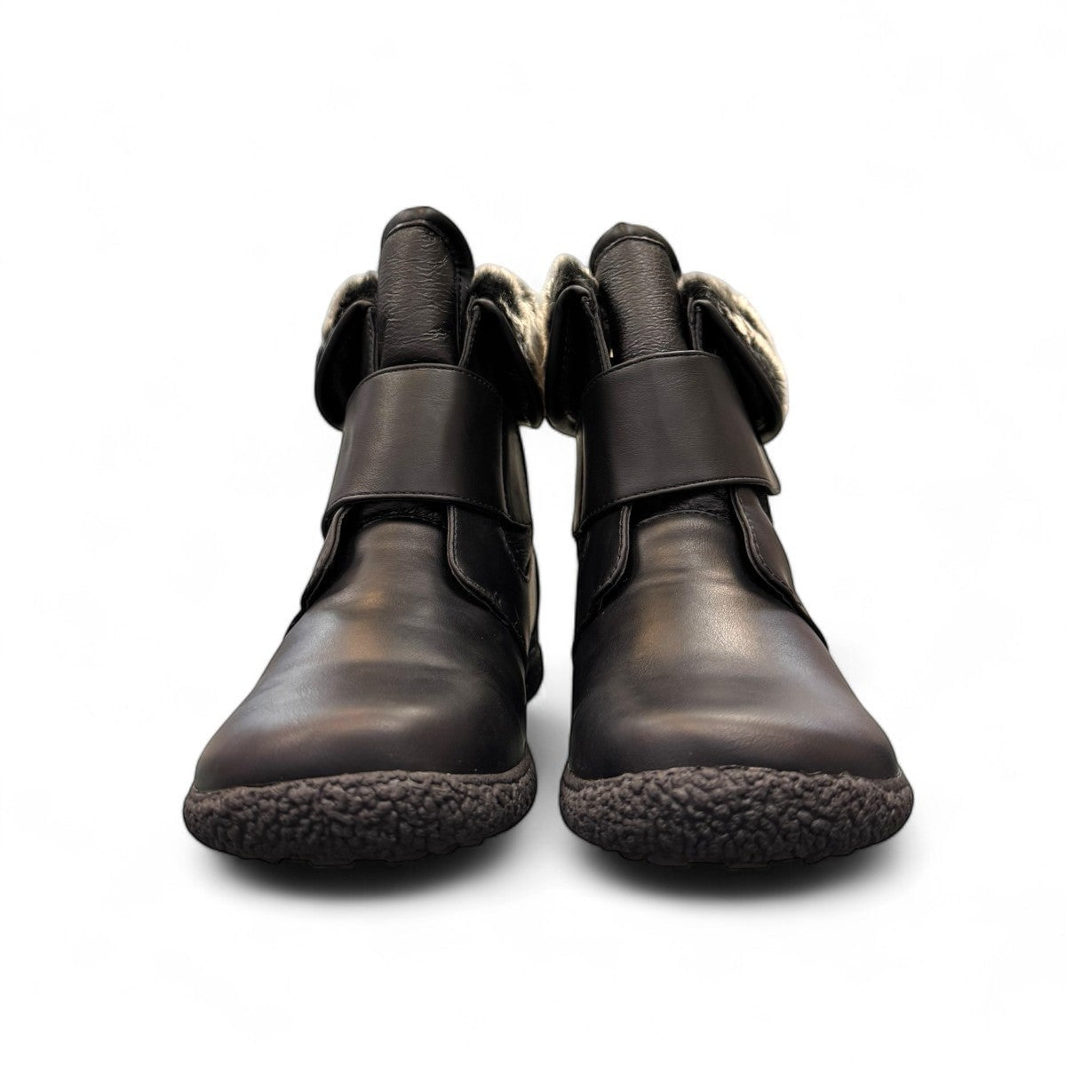Wanderlust black waterproof winter boots with faux fur trim and adjustable velcro strap