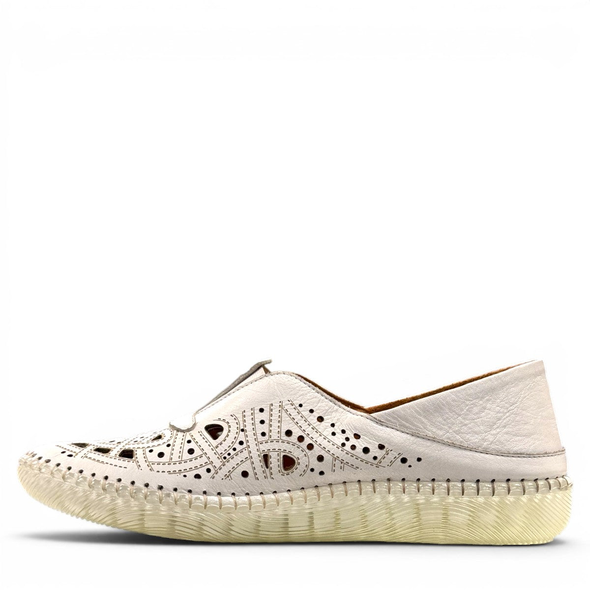 wonder-metadata-S5552 white leather slip-on shoe with intricate laser-cut patterns and a flexible cushioned sole.
photo of the left side