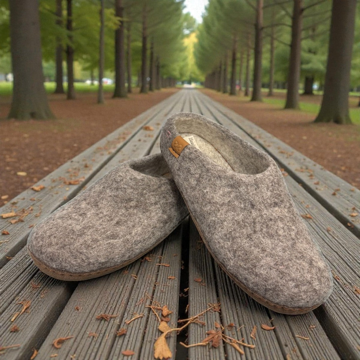 wool by green Makalu grey wool slippers with a brown EnergySole insole and artisan-signed leather tag side view