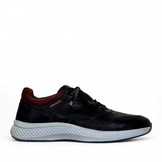XL EVER LIFE HANNA black leather sneaker with a white textured sole and maroon heel detail. Photo of right side view.