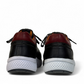 XL EVER LIFE HANNA black leather sneaker with a white textured sole and maroon heel detail. Photo of back view.