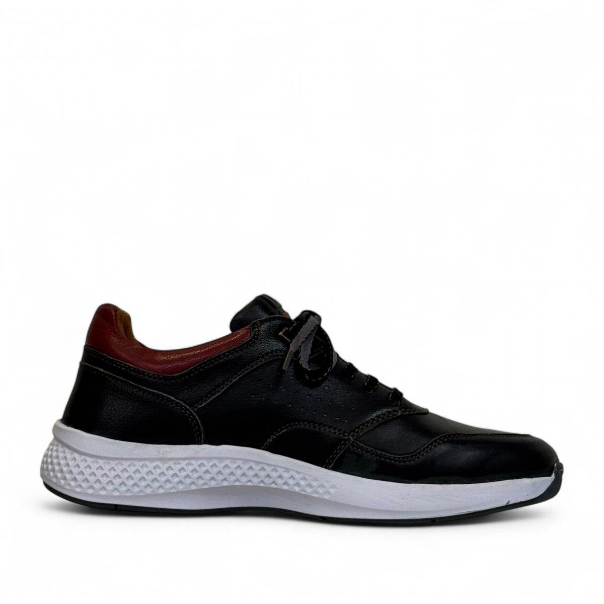 XL EVER LIFE HANNA black leather sneaker with a white textured sole and maroon heel detail. Photo of left side view.