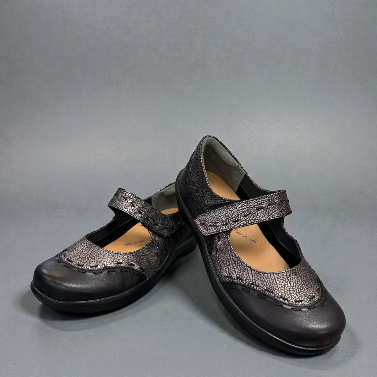 Ziera Gummibear Mary Jane flats in black antique pewter leather with supportive molded sole and strap.
photo of the front side