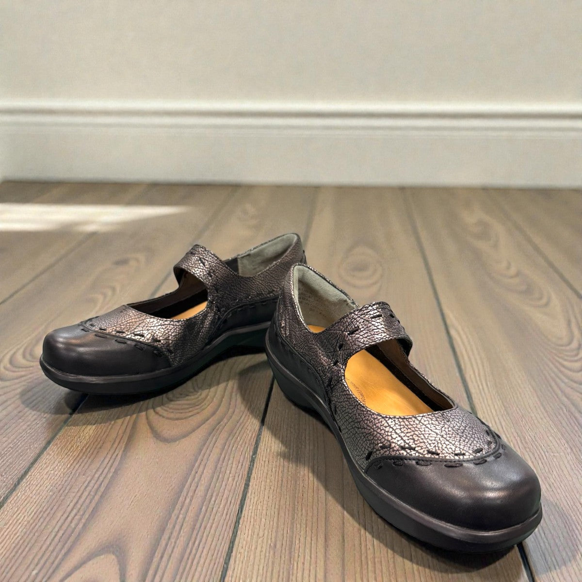 Ziera Gummibear Mary Jane flats in black antique pewter leather with supportive molded sole and strap.
photo of the front side